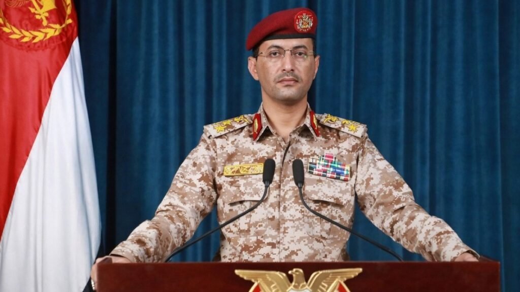 Houthi military spokesman Yahya Saree at a briefing podium (file photo)