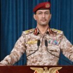 Houthi military spokesman Yahya Saree at a briefing podium (file photo)