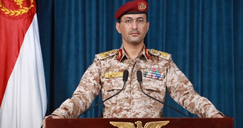 Houthi military spokesman Yahya Saree at a briefing podium (file photo)